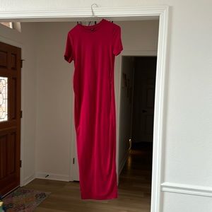 Maternity Tshirt dress with slit and ruching on the sides.